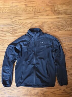 Nike Men's Black Performance Full-Zip Jacket with Subtle Pattern